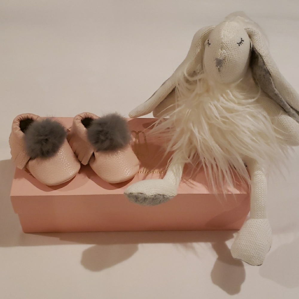 Pink baby shoes with grey faux fur pom pom